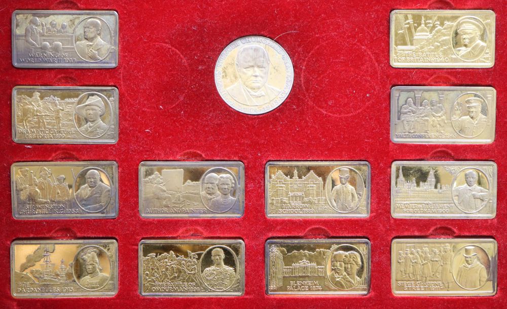 A cased set of twelve silver gilt The Churchill Years ingots and a similar medallion, gross 21.5oz.